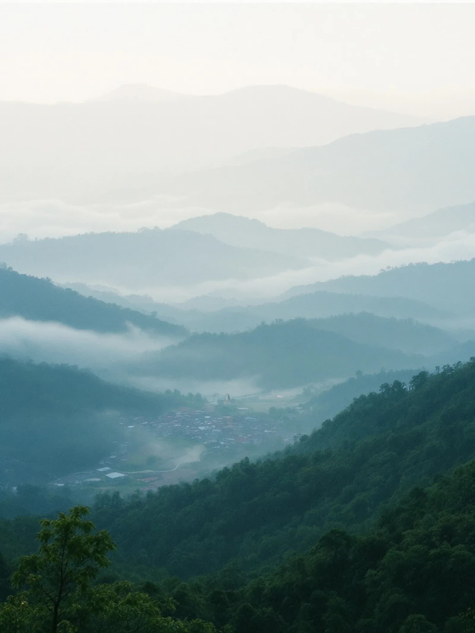 The Mogok valley in Myanmar, morning mist over hills